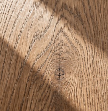 Close-up of white oak grain with a small knot